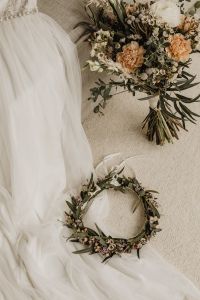 Kaboompics - Wedding Dress, Floral Hair Wreath and Bridal Bouquet Flat Lay