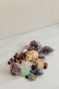 Kaboompics - Crystal Display on Textured White Wall and Shelf with Copy Space