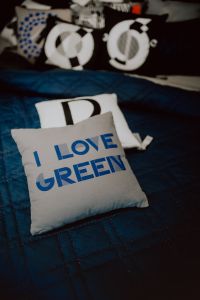 Kaboompics - Scandinavian decorative pillows on modern bed