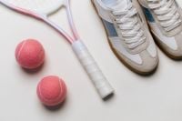 Kaboompics - Blue Sneakers, Tennis Racket and Pink Balls Flat Lay