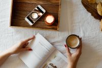 Kaboompics - Woman read book and drink coffee