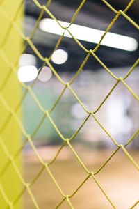 Close-ups of yellow wire netting