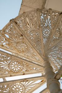 Kaboompics - Ornate Cast Iron Spiral Staircase Detail from Below, Italy