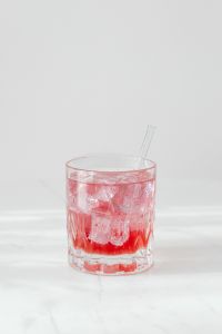 Kaboompics - Pale Raspberry Drink With Stirrer