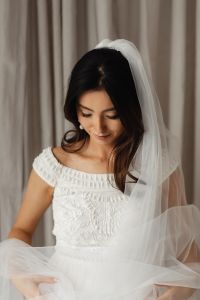 Kaboompics - Pearl Earrings and Embellished Neckline in a Bridal Fashion Portrait