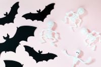 Kaboompics - Pink Halloween Background With Bats and Skeleton