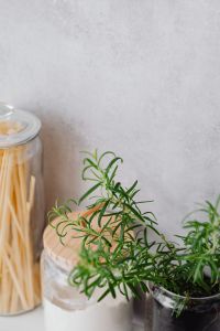Kaboompics - Subtle Pantry Still Life with a Glass Jar at the Edge and Neutral Copy Space
