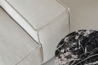 Kaboompics - Close Up Black Marble Side Table Beside Linen Sofa