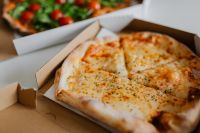 Kaboompics - A workplace full of pizza
