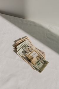 Kaboompics - Luxury Perfume and Money Aesthetic