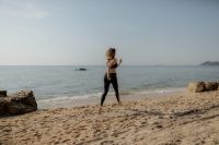 Kaboompics - Woman Standing by the Sea in Sportswear
