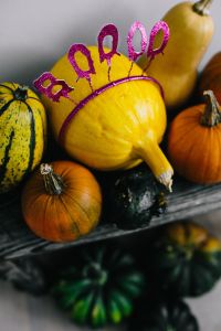 Kaboompics - Festive Halloween Pumpkin Still Life with Purple Boo Decor