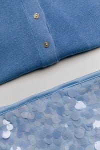 Kaboompics - Blue Polo Shirt and Blue Sequins Close-Up