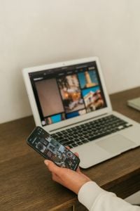 Kaboompics - Social Media Manager Working With Laptop and Smartphone