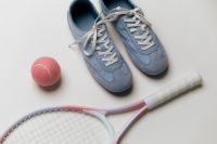 Kaboompics - Blue Sneakers, Tennis Racket and Pink Ball Flat Lay
