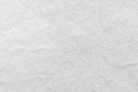 Kaboompics - Wrinkled White Paper Texture with Fine Diagonal Creases, Clean Neutral Background for Branding and Editorial Design