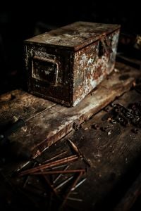 Kaboompics - Vintage Metal Box With Corroded Sides and Label Holder