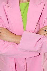 Kaboompics - Person in Pink Suit with Arms Crossed