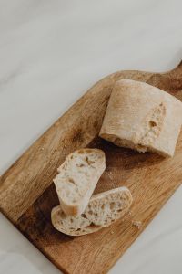 Kaboompics - Overhead View of Sliced Rustic Bread on a Wooden Board