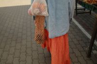 Kaboompics - Woman Carrying Reusable Mesh Bags at a Market
