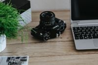 Kaboompics - Black-and-white photos with a silver laptop and a camera