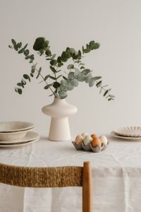Kaboompics - Easter Table Decor With Eucalyptus Vase And Pastel Eggs