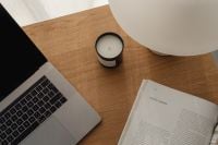 Kaboompics - Overhead Desk Scene with Laptop, Candle and Travertine Lamp