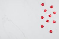 Kaboompics - Valentine Background with Red Hearts on a white Marble