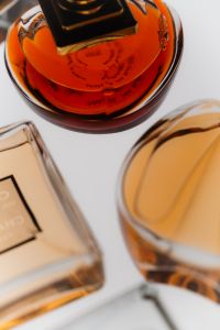Kaboompics - Stacked Glass Perfume Bottles Still Life