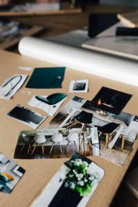 Kaboompics - Designers working with material samples and paper cutouts