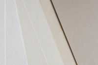 Kaboompics - Light Beige and White Paper Surface with Gentle Creases