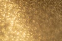 Kaboompics - Soft-Focus Gold Glitter Macro in Warm Tones