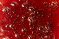 Kaboompics - Red Skincare Liquid Bubbles