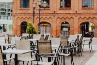 Kaboompics - Rows of Café Chairs and Tables outside the Manufaktura Brick Shopping Complex, Łódź