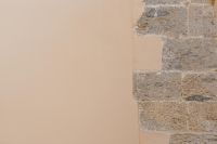 Kaboompics - Beige Plaster Wall and Rough Gray Stone Blocks, Naples Italy Architectural Texture with Copy Space