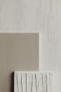 Kaboompics - Vertical White Paint Sample with Raised Brush Texture
