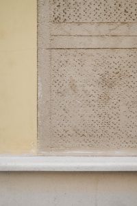 Kaboompics - Minimal Perforated Stone Wall Background