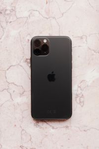 Kaboompics - Black Apple iPhone 11 Pro Centered on Pink Marble
