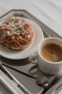 Kaboompics - Glazed Pastry and Coffee Flat Lay on Silver Tray
