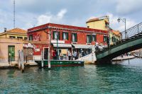 Kaboompics - Canal-Side Houses and a Pedestrian Bridge over a Murano Waterway, Venice Travel Photo