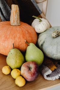 Kaboompics - Striped Gourd, White Mini Pumpkin, Pears and Red Apple, Cozy Autumn Harvest Still Life