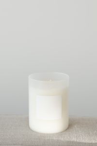 Kaboompics - Close-Up White Candle Mockup with Blank Label and Copy Space