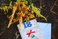 Kaboompics - Yellow flowers with a birthday card