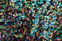 Kaboompics - Dark Multicolor Sequin Texture with Teal, Gold and Purple Highlights