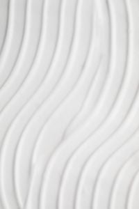Kaboompics - Vertical Curved Ridges in White Cream, Clean Minimal Beauty Macro Background