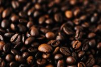 Kaboompics - Shallow-Focus Dark Coffee Beans with Warm Highlights for Specialty Coffee Content