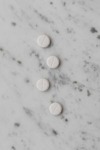 Kaboompics - Four White Scored Tablets on Marble