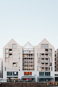 Kaboompics - Gdańsk Poland Contemporary White Waterfront Building with Geometric Gabled Roofs