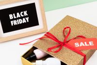 Kaboompics - Close-Up Black Friday Display with Open Gift Box and Sale Tag