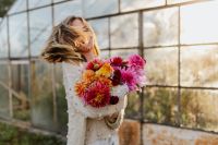 Kaboompics - Woman Holding Dahlia Bouquet Outside A Greenhouse